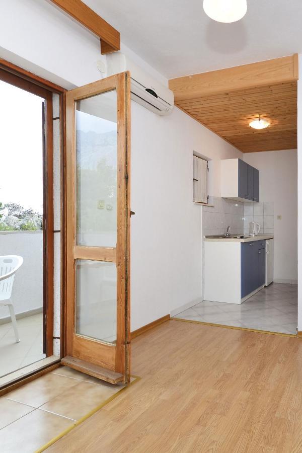 Family friendly apartments with a swimming pool Baska Voda, Makarska - 12442 Exteriör bild